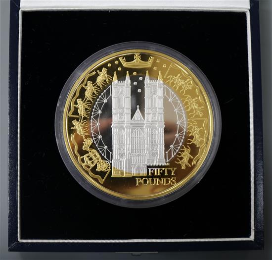 A Royal Mint 2002 HM the Queen Golden Jubilee Alderney £50 silver proof kilo coin, cased with certificate